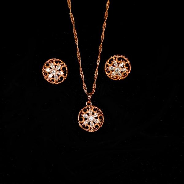 Dije y aretes flores con zirconias 14K-21