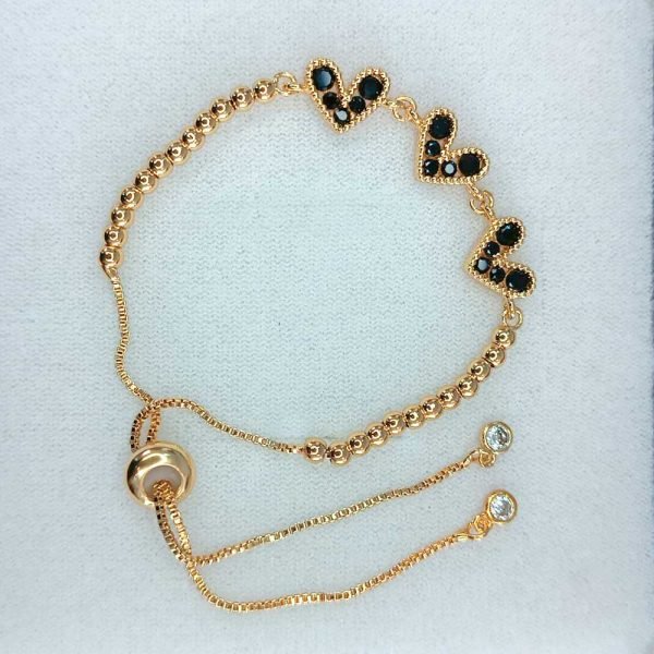 Pulsera 3 corazones negros 18K-65