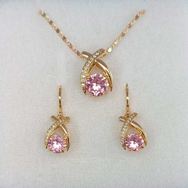 Juego moño rosa 18K-78